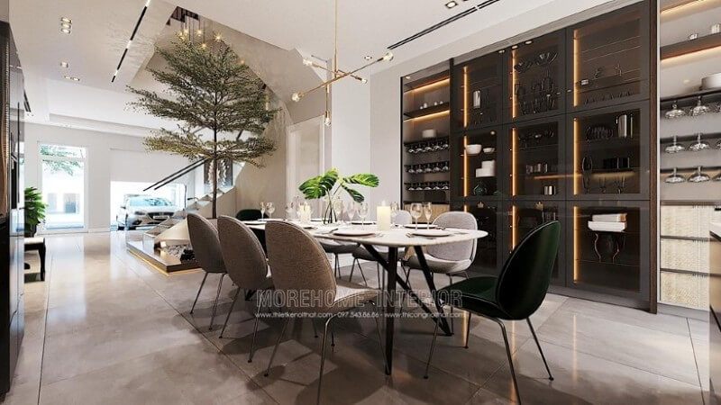 Bộ bàn ghế ăn hiện đại đẹp với 6 chiếc ghế ăn bọc vải màu ghi xám, 2 chiếc ghế ăn bọc vải màu xanh coban ấn tượng - kiểu dáng tinh tế lai nhẹ nhàng, chiếc bàn ăn chân gỗ tự nhiên mặt bàn đá nhân tạo vân mây cao cấp. Kết nối khu vực phòng bếp với phòng ăn thêm hài hòa và khoa học.