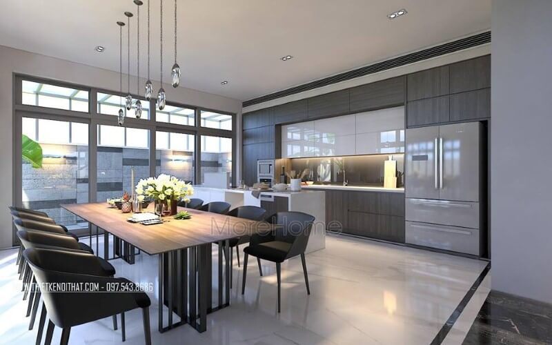 Bộ bàn ghế ăn, đèn thả, tủ bếp acrylic, laminate đã tạo nên vẻ đẹp sang trọng, độc đáo cho phòng ăn liền bếp.